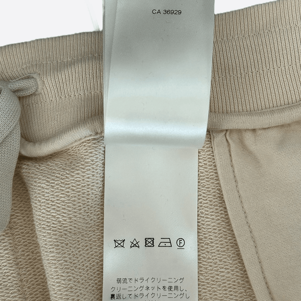 Louis Vuitton Beige & White Logo Shorts - Morely TrendsLouis Vuitton Type here:)