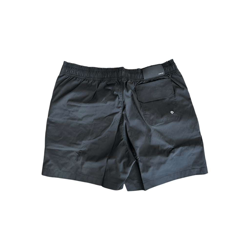 Amiri Black & White Stack Logo Swimshorts - Morely TrendsAmiri Type here:)